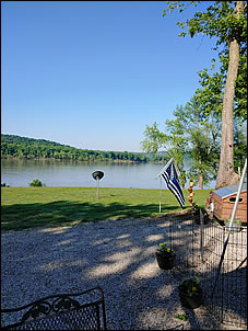 daytime view of the Ohio River from a riverfront campsite