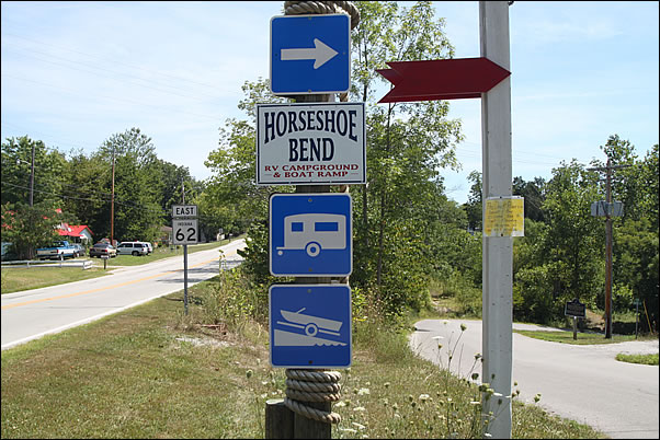 signs at turn off SR 62 E